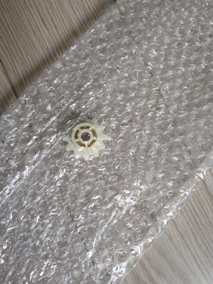 34B7499821 34B7499822 SPROCKET GIGI 12 O CUT UNTUK FUJI FRONTIER 330 340 350 370 550 570 Minilab pemasok